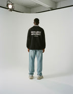 Know Jesus, Know Peace Signature Black Striped Collar Sweatshirt | Peace®